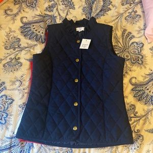 Navy ivory and red girls vest.